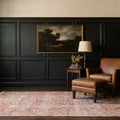 Orange Turkish rug in a den