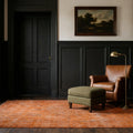 Orange Turkish rug in a styled room