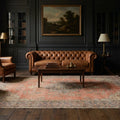 Orange Turkish rug in a styled room