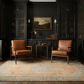 Orange Turkish rug in a styled room