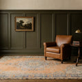 Orange Turkish rug in a styled room