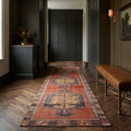 Red Turkish runner rug in a corridor
