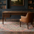 Red Turkish runner rug in a study