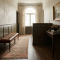 Pink Turkish runner rug in a corridor