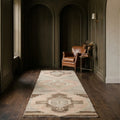 Beige Turkish runner rug in a den