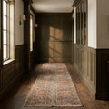 Brown Turkish runner rug in a library