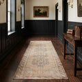 Beige Turkish runner rug in a hallway
