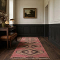 Red Turkish runner rug in a conservatory