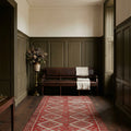 Red Turkish runner rug in a corridor