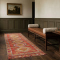 Red Turkish runner rug in a hallway