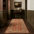 Orange Turkish runner rug in a styled room