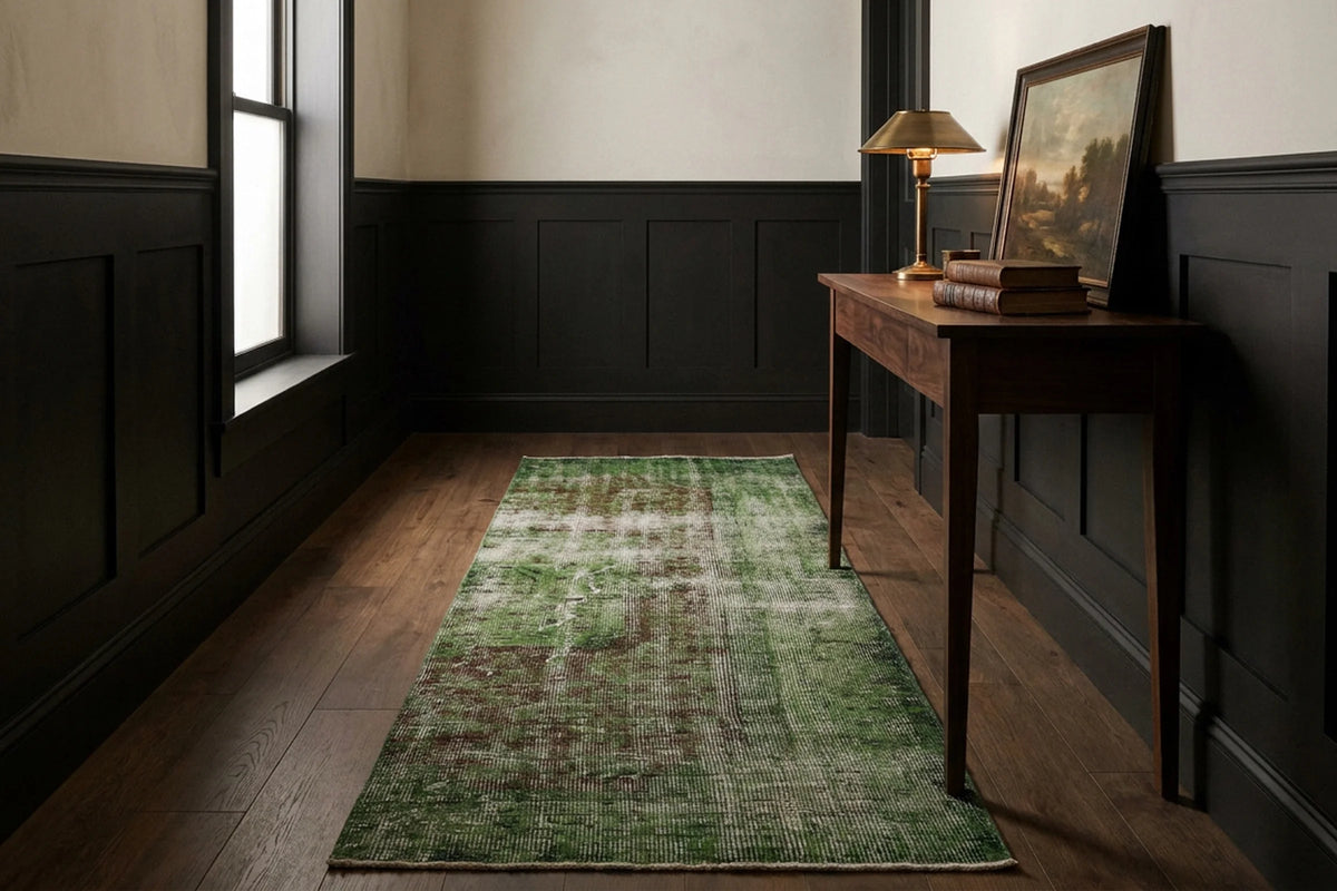 Green Turkish runner rug in a styled room