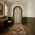 Brown Turkish runner rug in a styled room