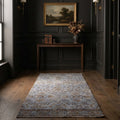 Navy Turkish runner rug in a corridor