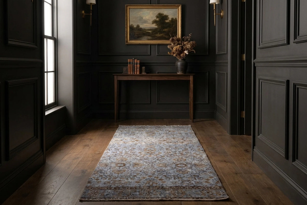 Navy Turkish runner rug in a corridor