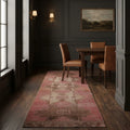 Pink Turkish runner rug in a dining room