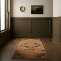 Orange Turkish runner rug in a styled room