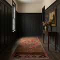Brown Turkish runner rug in a corridor