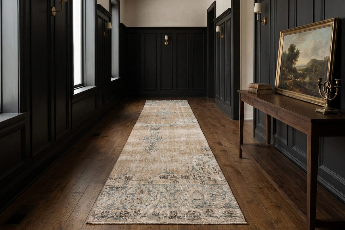 Beige Turkish runner rug in a corridor