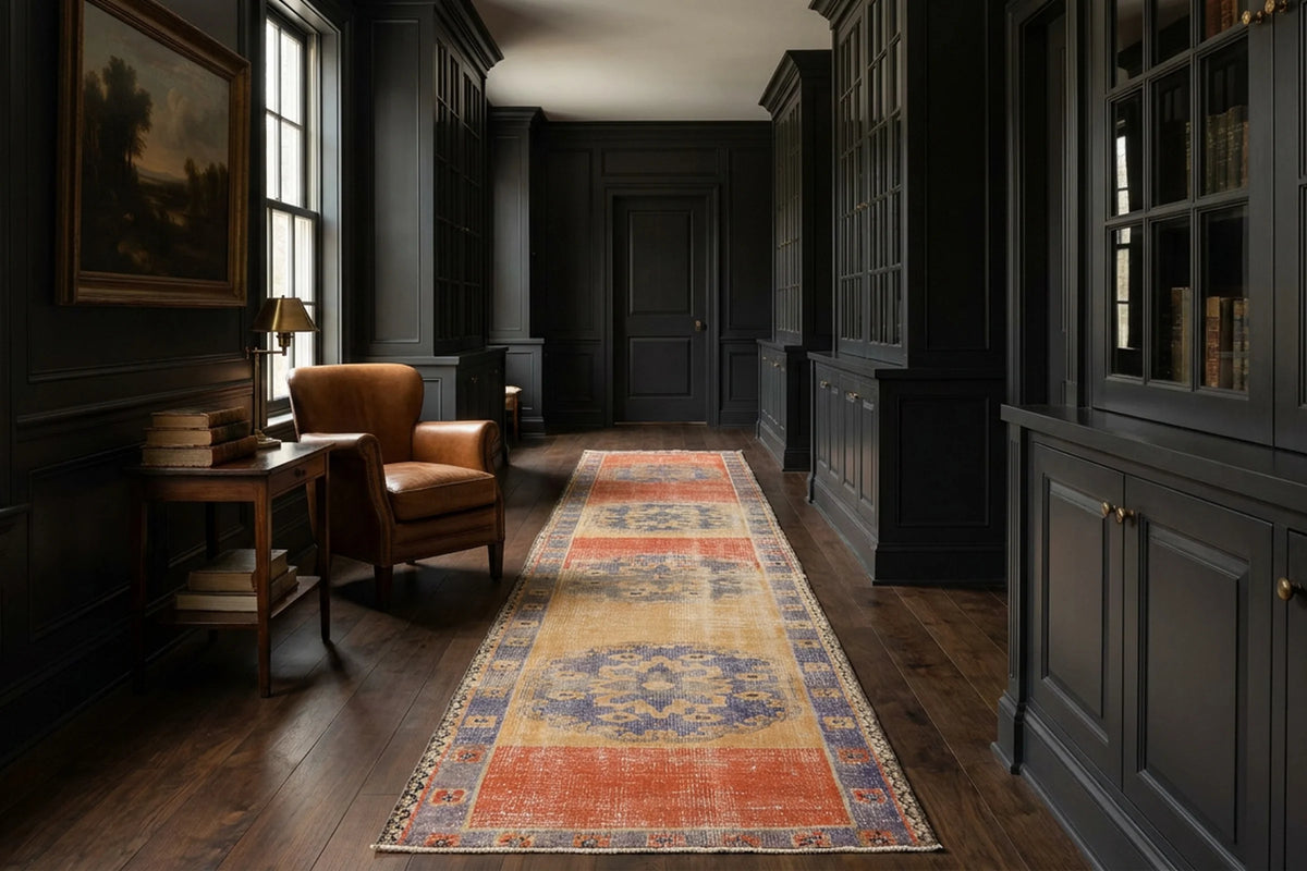 Orange Turkish runner rug in a library