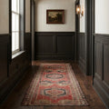 Red Turkish runner rug in a styled room