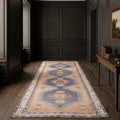 Orange Turkish runner rug in a corridor