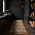 Brown Turkish runner rug in a styled room