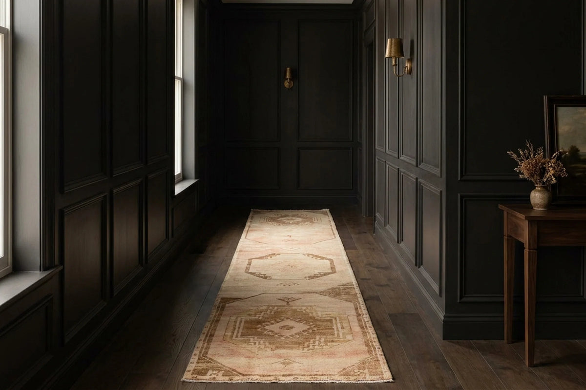 Beige Turkish runner rug in a corridor