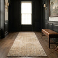 Beige Turkish runner rug in a hallway