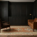 Orange Turkish runner rug in a den