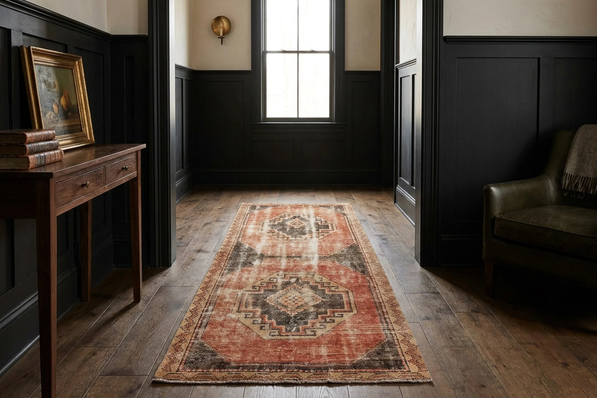 Red Turkish runner rug in a den