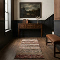 Brown Turkish runner rug in a landing