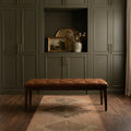 Orange Turkish runner rug in an entryway