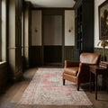 Pink Turkish runner rug in a corridor