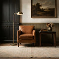 Beige Turkish runner rug in a conservatory