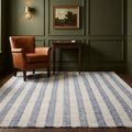 Blue Striped Flatweave area rug in a living room