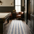 Blue Fringed Flatweave area rug in a living room