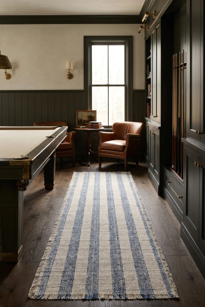 Blue Fringed Flatweave area rug in a living room