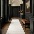 White Flatweave runner rug in a den