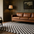 Checkered Shaggy Wool area rug in a den