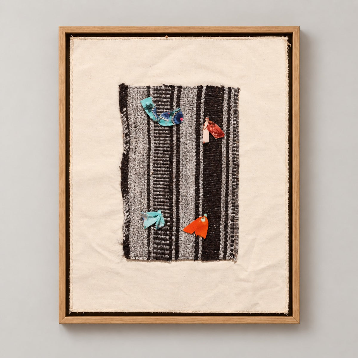 Framed vintage kilim fragment wall art in black, gray, ivory, turquoise, orange