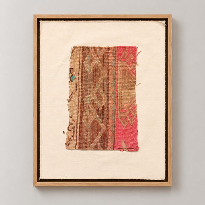 Framed vintage kilim fragment wall art in brown, tan, pink