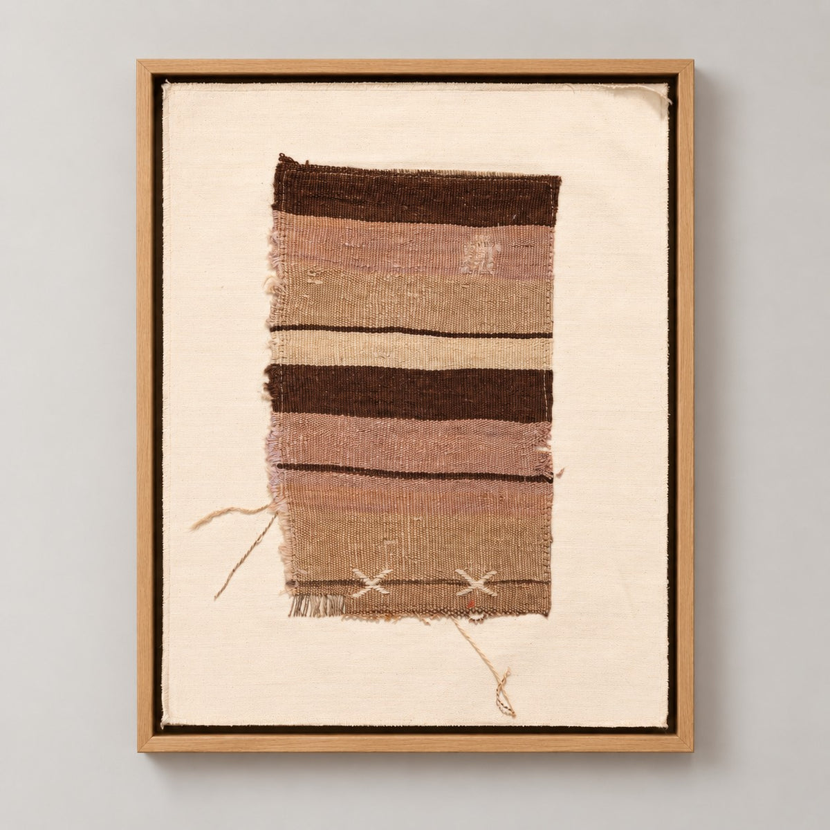 Framed vintage kilim fragment wall art in taupe, mauve, dark brown, ivory