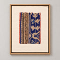 Framed vintage rug fragment wall art in cobalt blue, tan, red