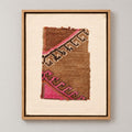 Framed vintage rug fragment wall art in camel, pink, black