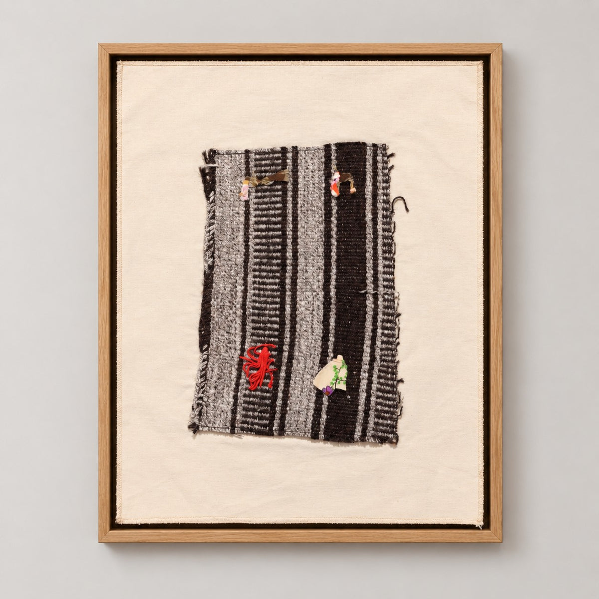 Framed vintage kilim fragment wall art in black, gray, ivory, red