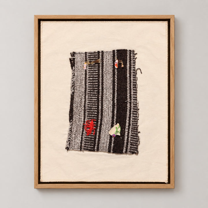 Framed vintage kilim fragment wall art in black, gray, ivory, red