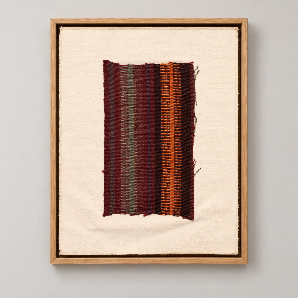 Framed vintage kilim fragment wall art in burgundy, gray, green, orange